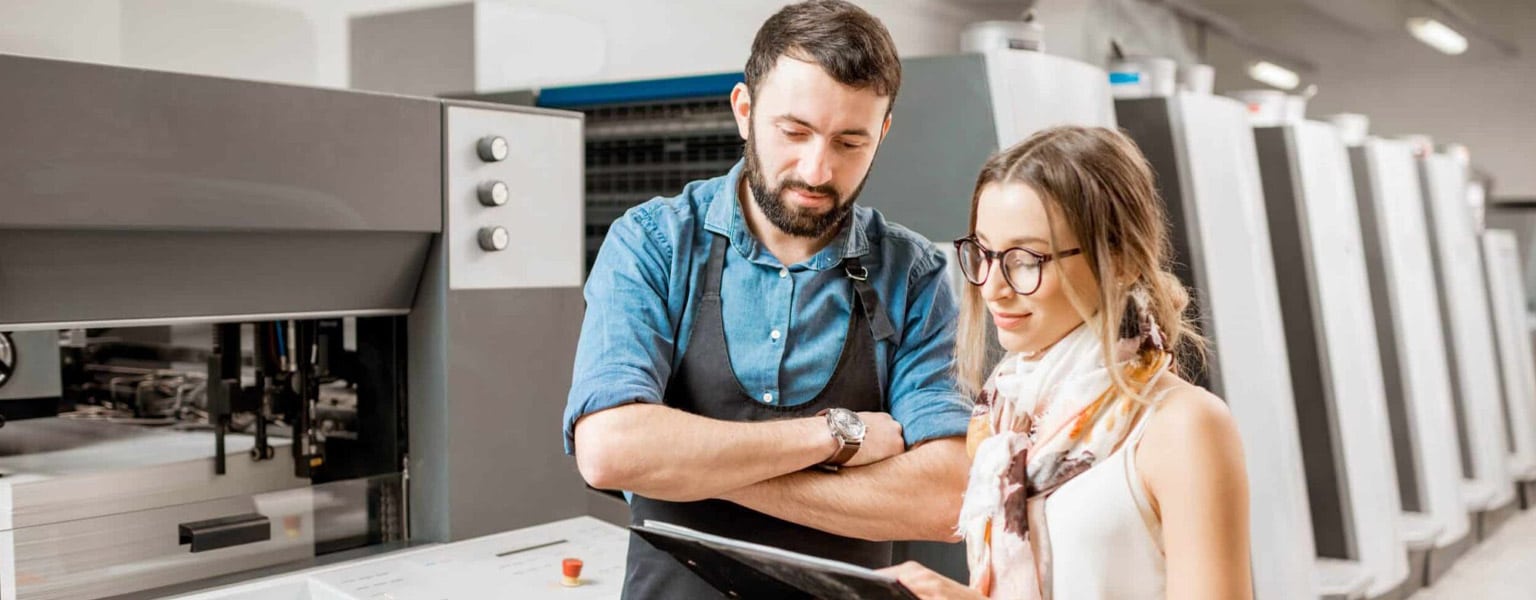 Two people discussing print security